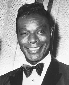 Nat "King" Cole. Reproduced by permission of AP/Wide World Photos.