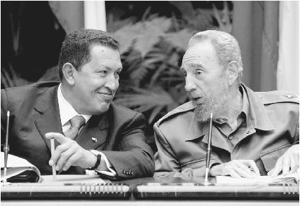 Venezuelan president Hugo Chvez meets with Cuban president Fidel Castro during an official visit to Cuba in 2004.  Claudia Daut/Reuters/Corbis.