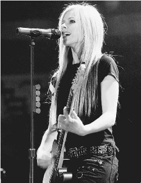 With edgy lyrics and a strong voice, Avril Lavigne has become one of Americas top-selling entertainers. AP/ Wide World Photos.