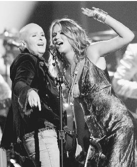 At the 47th Grammy Awards, Melissa Etheridge and Joss Stone brought the audience to its feet during their tribute to the late Janis Joplin. AP/Wide World Photos.