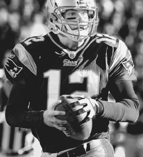 Tom Brady of the New England Patriots, during a 2003 game against the Buffalo Bills. AP/Wide World Photos. Reproduced by permission.