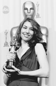 Sophia Coppola poses with her Academy Award for Original Screenplay for Lost in Translation. AP/Wide World Photos. Reproduced by permission.