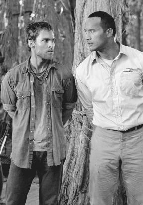 Sean William Scott (left) and Dwayne The Rock Johnson in a still from the movie The Rundown (2003). Universal/Columbia/The Kobal Collection/Aronowitz, Myles.