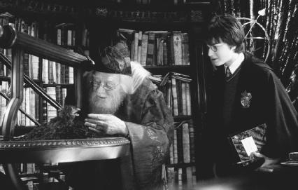 Richard Harris (left) as Dumbledore and Daniel Radcliffe in a scene from Harry Potter and the Chamber of Secrets.  The Kobal Collection.
