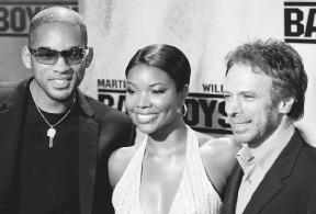 Gabrielle Union (center) poses with Will Smith (left) and producer Jerry Bruckheimer at the Germany premiere of Bad Boys II. AP/Wide World Photo. Reproduced by permission.