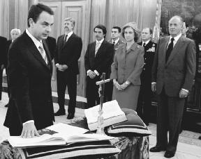 Jos Luis Rodrguez Zapatero (left) is sworn in as the Prime Minister of Spain, April 17, 2004. Onlookers include Spanish King Juan Carlos (right) and Queen Sofia.  Reuters/Corbis.