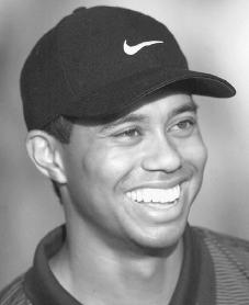 Tiger Woods. Reproduced by permission of AP/Wide World Photos.