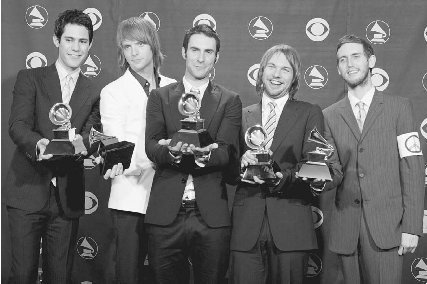 Maroon 5 pose with their awards for Best New Artist at the Grammy Awards. From left: Mickey Madden, James Valentine, Adam Levine, Ryan Dusick, and Jesse Carmichael. AP/ Wide World Photos.