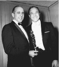 Jerome Robbins (left) with famous actor/dancer Gene Kelly. AP/Wide World Photos.