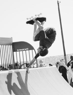 Tony Hawk skates at the Edwards Air Force Base skatepark in California, in 2004. AP/Wide World Photos. Reproduced by permission.