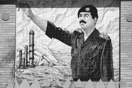 Tiled portrait of Saddam Hussein in Tikrit, Iraq. Many such images and statues of Hussein appeared in cities throughout Iraq. © Shepard Sherbell/Corbis.